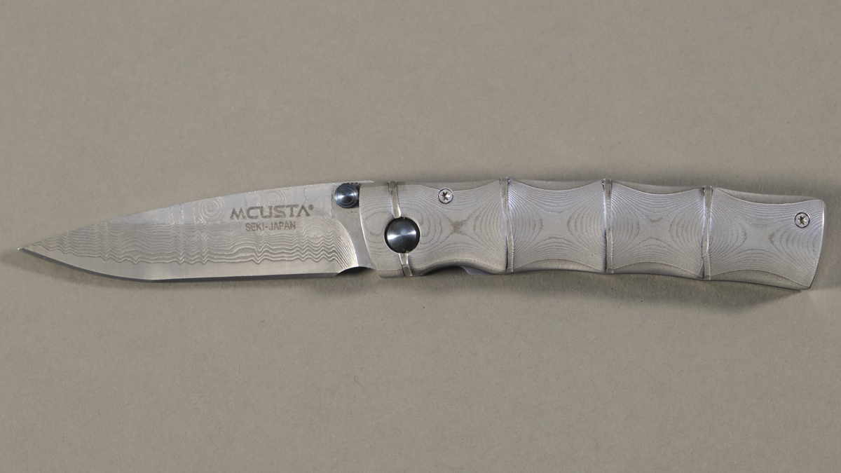 Couteau japonais pliant Mcusta Take - manche 9,5 cm acier VG-10 damas inox 66 couches