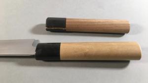 Prestation de changement de manche de couteau japonais en atelier